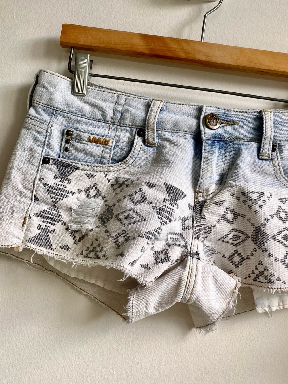 Y2K low-rise tribal distressed denim shorts - pale blue, white & gray